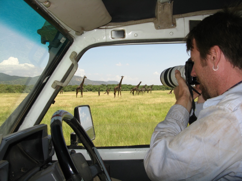 Derek Lee photographing Masai giraffe, Wild Nature Institute